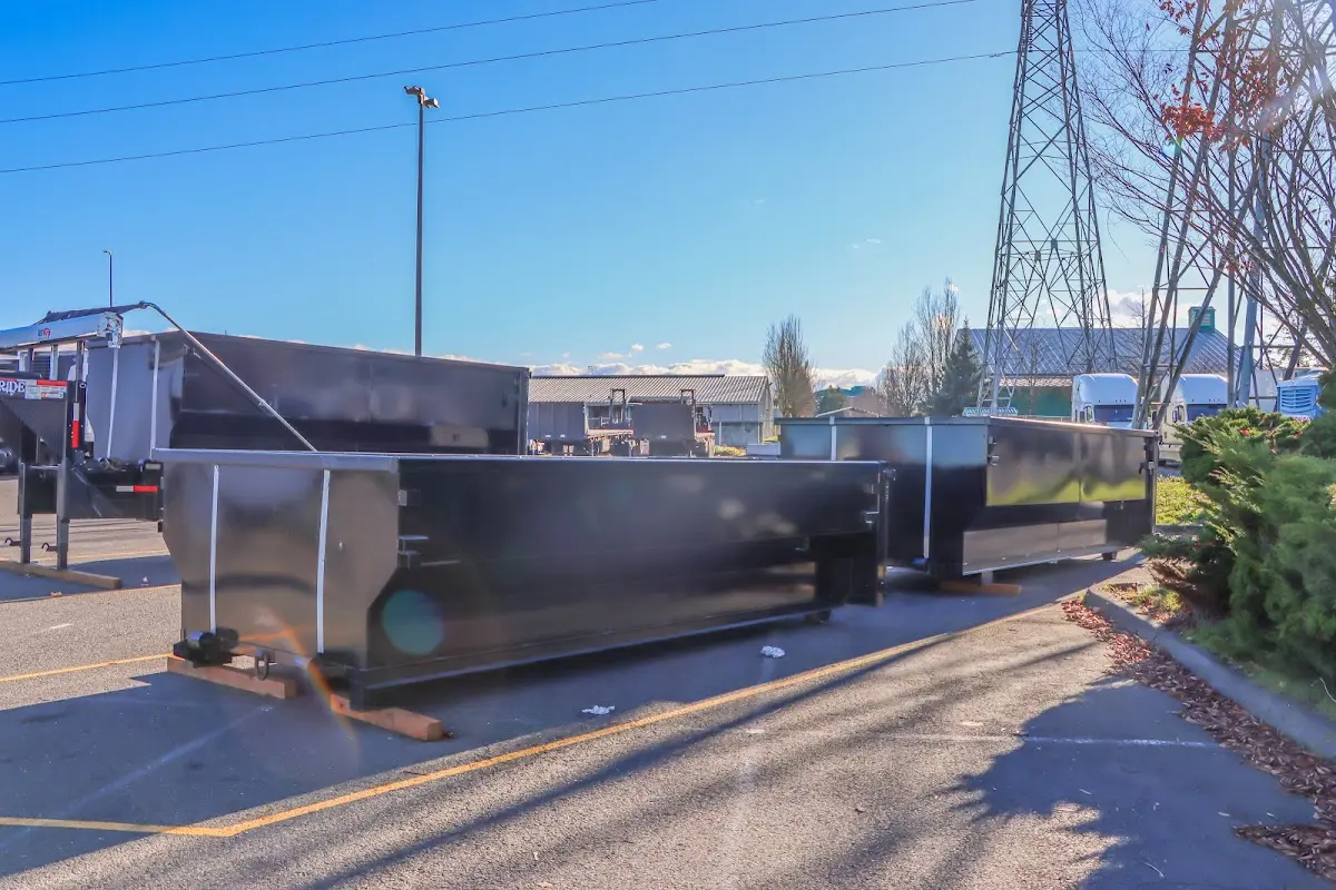 Roll-off dumpster ready for waste disposal at job site for Concrete Dumpster Rental in Lackland AFB